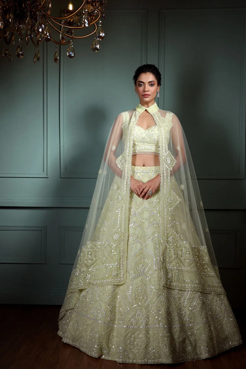 Mint Lehenga with Mirror Embellishments.